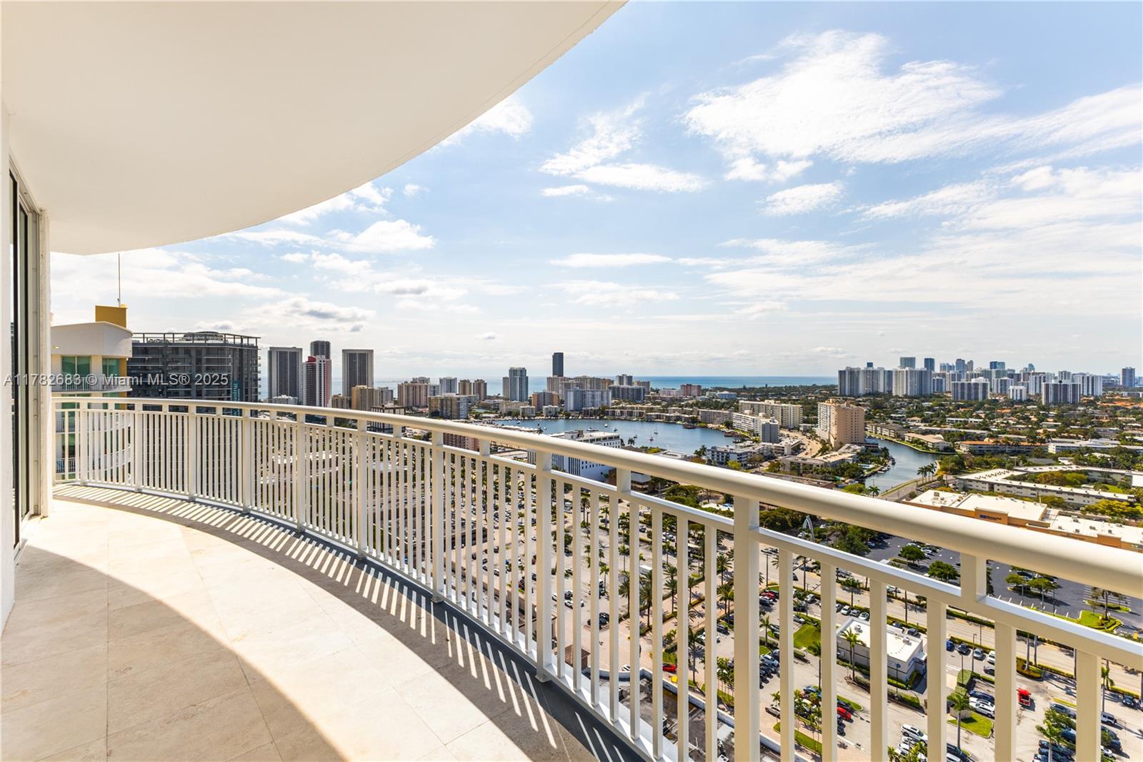 1745 East Hallandale Beach Boulevard, Unit PH04W Hallandale Beach, FL 33009 - Photo 1 of 38 a view of balcony with city