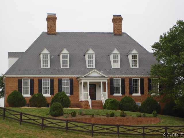3812 Old Gun Road West Midlothian, VA 23113 - Photo 1 of 10 a front view of a house with garden