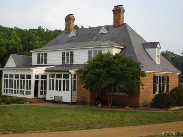 3812 Old Gun Road West Midlothian, VA 23113 - Photo 4 of 10 a front view of a house with a yard