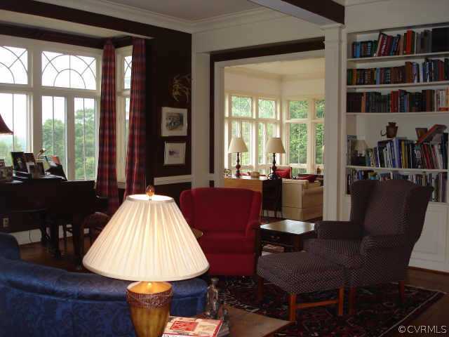 3812 Old Gun Road West Midlothian, VA 23113 - Photo 10 of 10 a living room with furniture a lamp and large window
