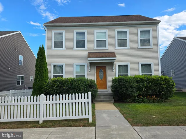 a front view of house with yard