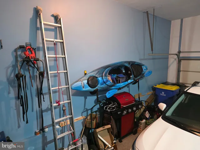 a bedroom with bed and window