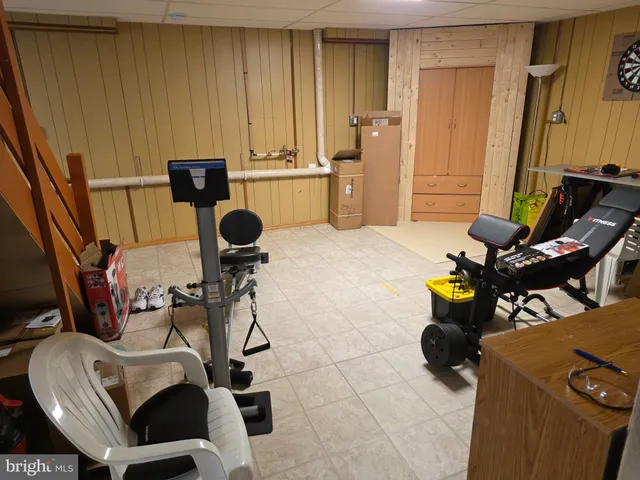 a bedroom with a bed and a closet