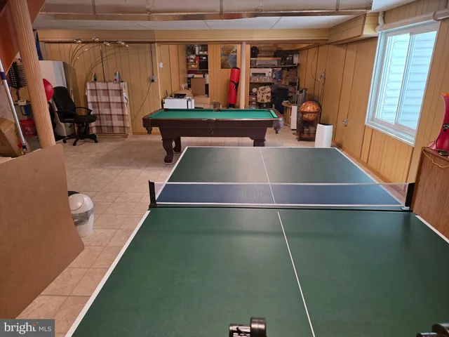 a living room filled with furniture and a couch