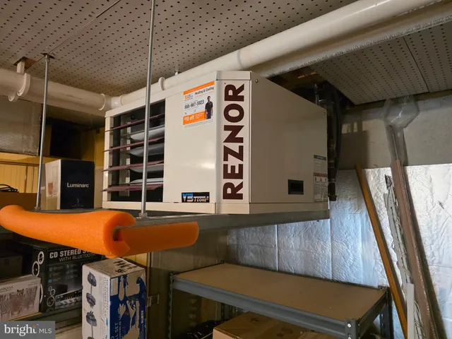 a view of a chairs and table in a balcony