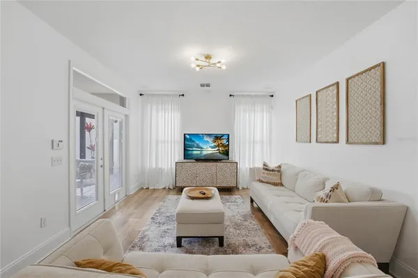 a living room with furniture and a view