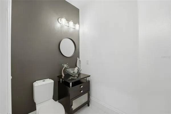 a view of entryway with wooden floor and stairs