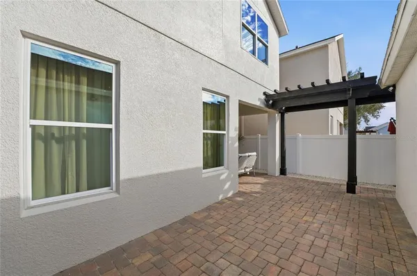 an aerial view of a house with a garden
