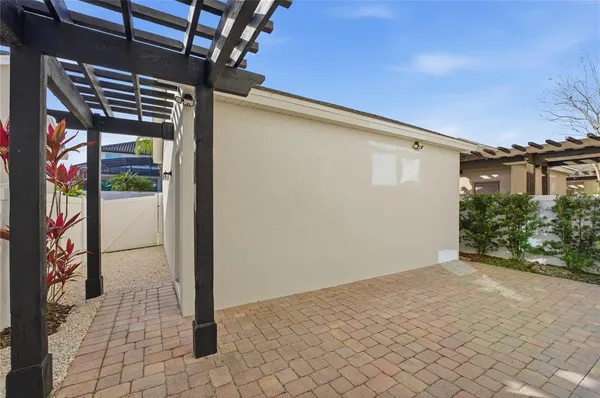 an aerial view of residential houses and car parked