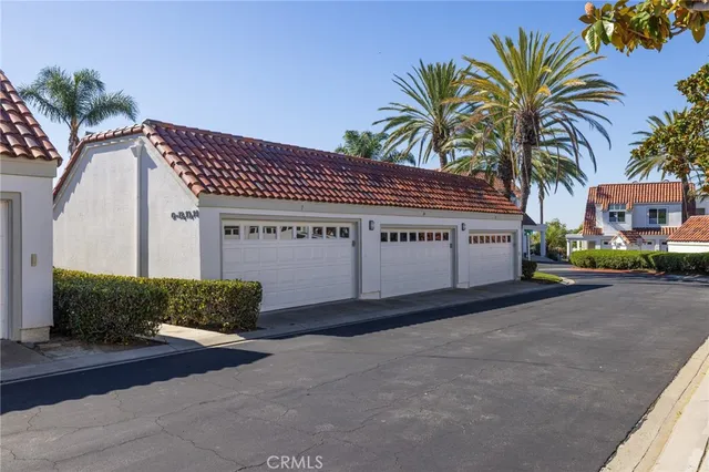 a view of a swimming pool with a lounge chairs