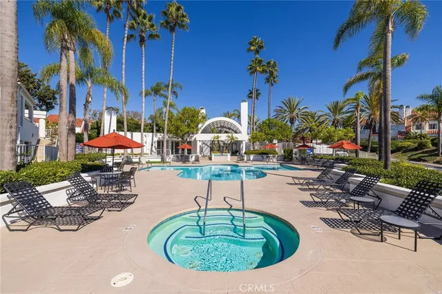 a view of a room with a table and chairs