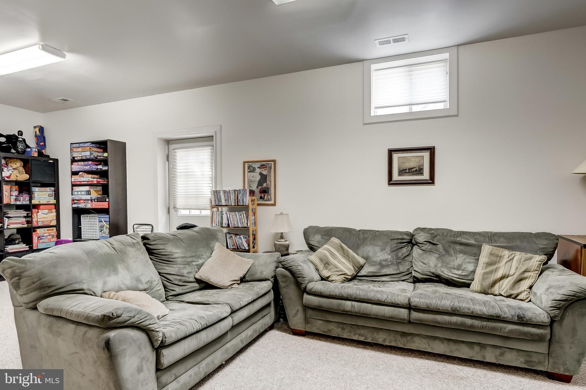 7804 Muncaster Mill Road Gaithersburg, MD 20877 - Photo 28 of 34 Basement Living Area