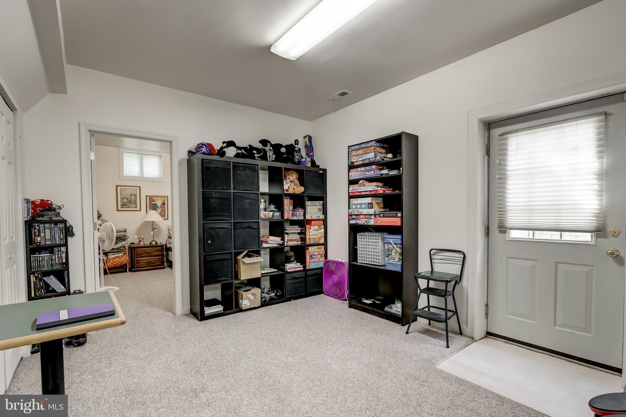 7804 Muncaster Mill Road Gaithersburg, MD 20877 - Photo 29 of 34 Basement Living Area