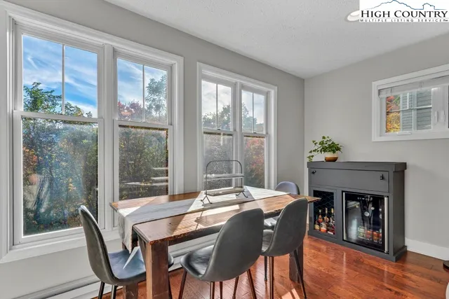 a view of two chairs in the balcony