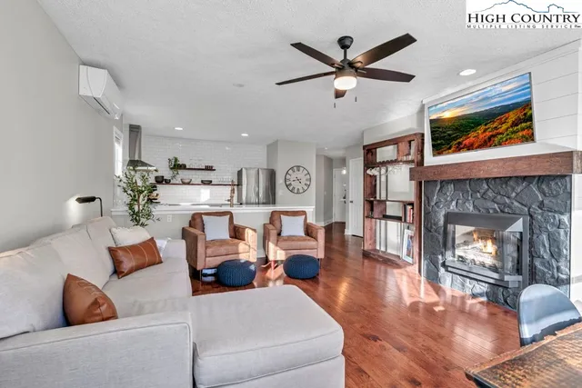 a kitchen with stainless steel appliances a stove sink and cabinets