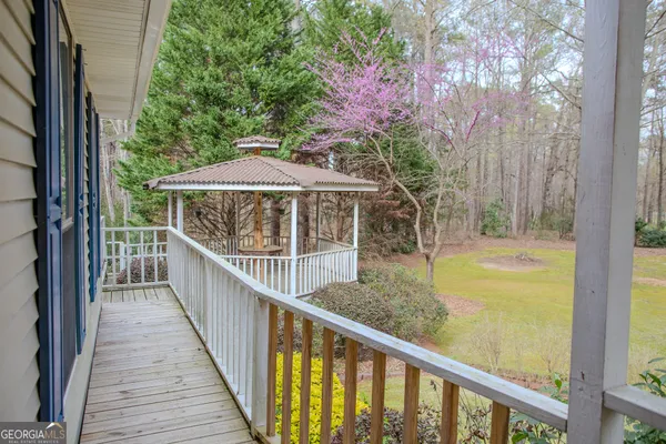 a bathroom with a double vanity sink mirror and shower