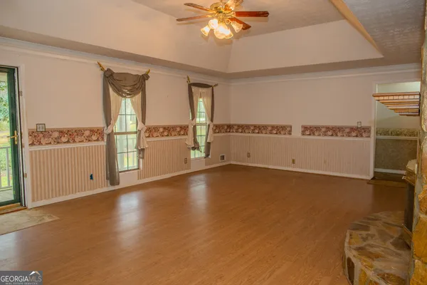 a bedroom with a bed and furniture