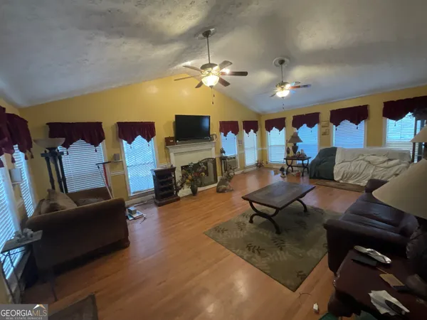 a backyard of a house with lots of green space