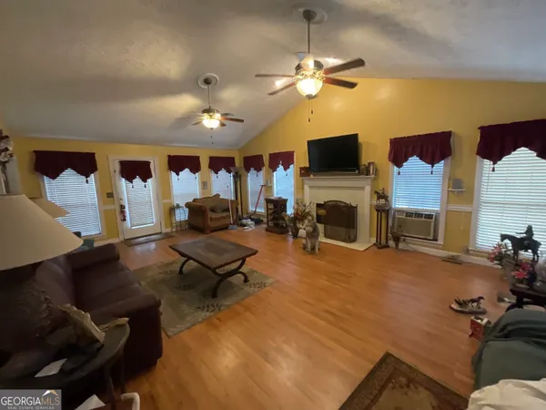 a living room with a fireplace