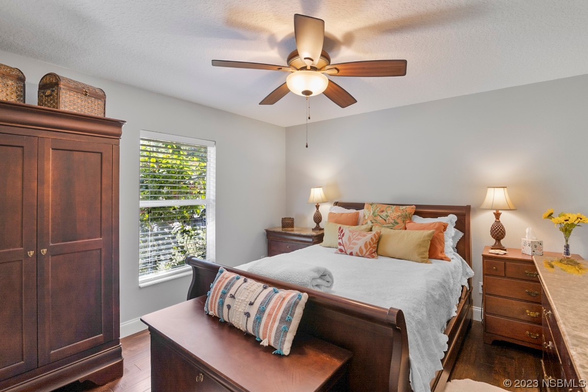 1815 Air Park Road Edgewater, FL 32132 - Photo 26 of 54 a bedroom with a bed and a window