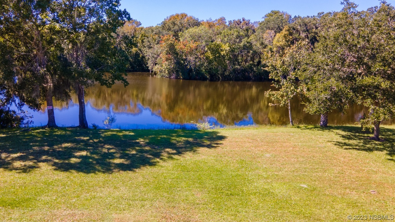 1815 Air Park Road Edgewater, FL 32132 - Photo 32 of 54 a view of swimming pool with an outdoor space