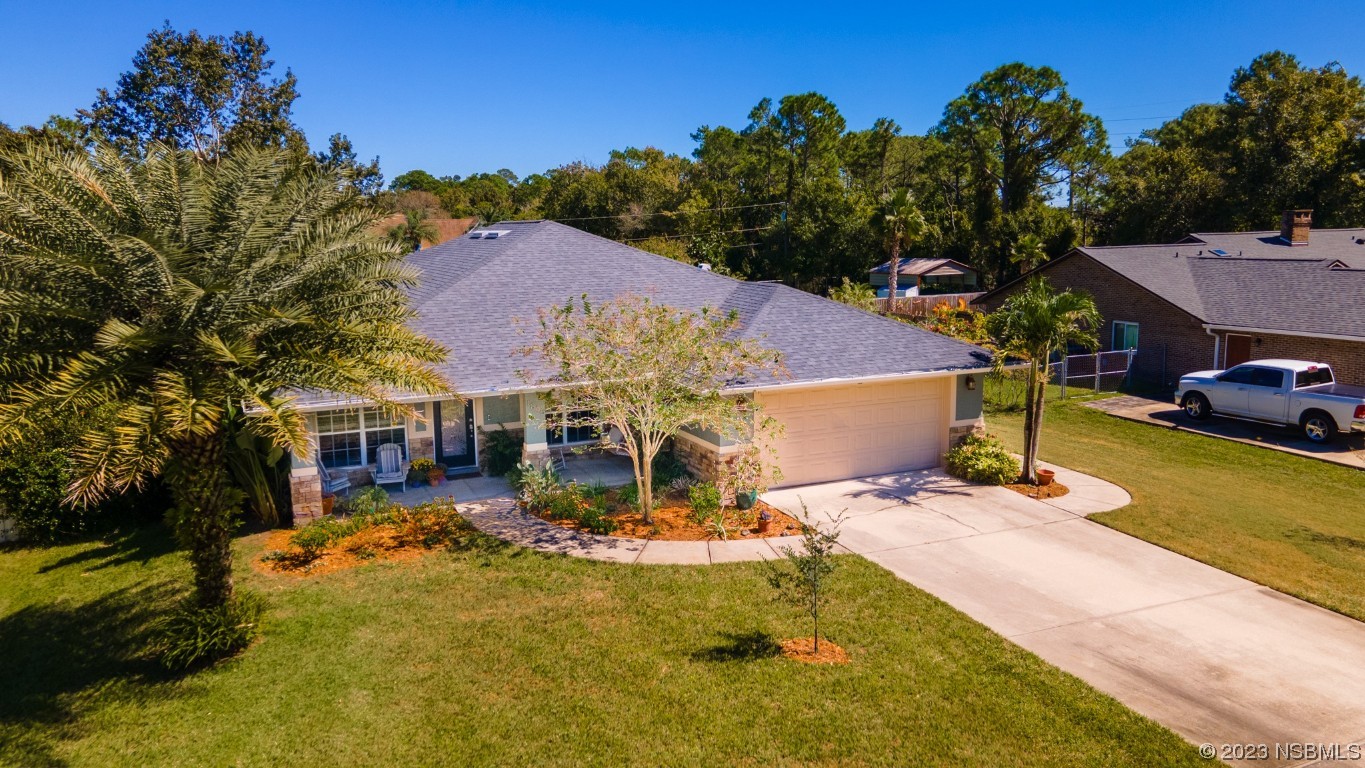 1815 Air Park Road Edgewater, FL 32132 - Photo 52 of 54 an aerial view of a house with swimming pool garden and patio