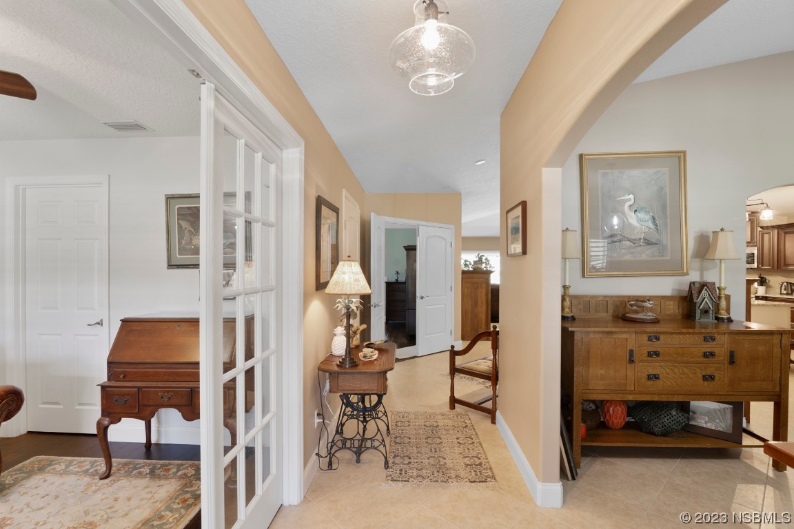 1815 Air Park Road Edgewater, FL 32132 - Photo 6 of 54 a view of hall way with furniture and toys