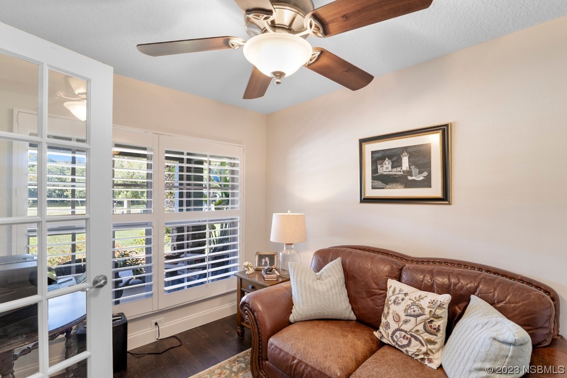 1815 Air Park Road Edgewater, FL 32132 - Photo 8 of 54 a living room with furniture and a large window