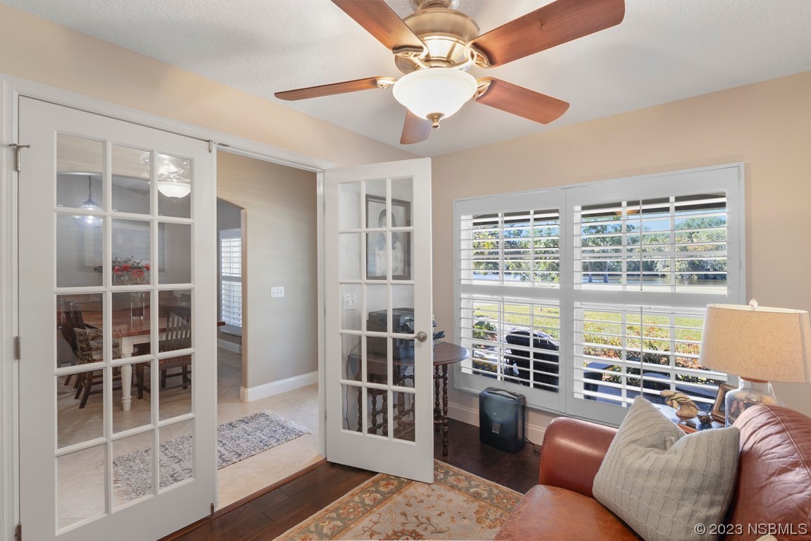 1815 Air Park Road Edgewater, FL 32132 - Photo 9 of 54 a living room with furniture and a large window