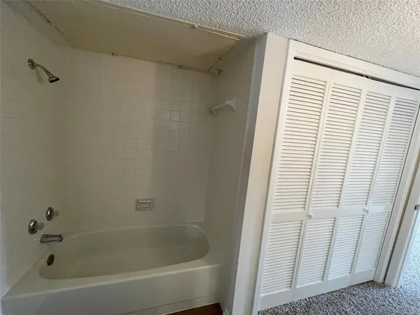 a bathroom with a bathtub