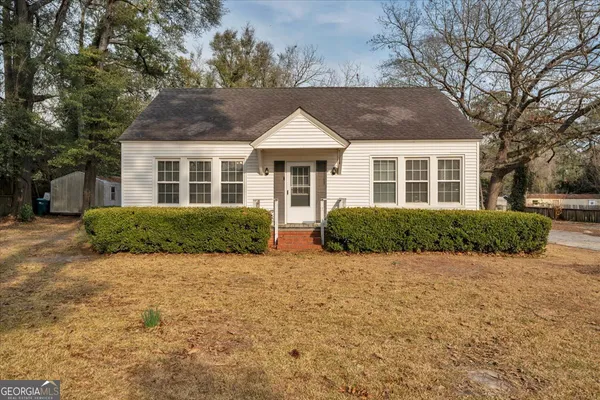 front view of a house with yard