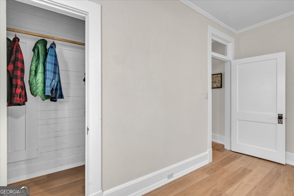 425 3rd Street Vienna, GA 31092 - Photo 16 of 40 a view of a walk in closet