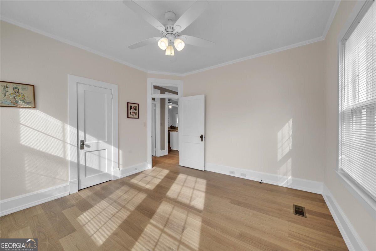 425 3rd Street Vienna, GA 31092 - Photo 18 of 40 a view of livingroom with an empty room