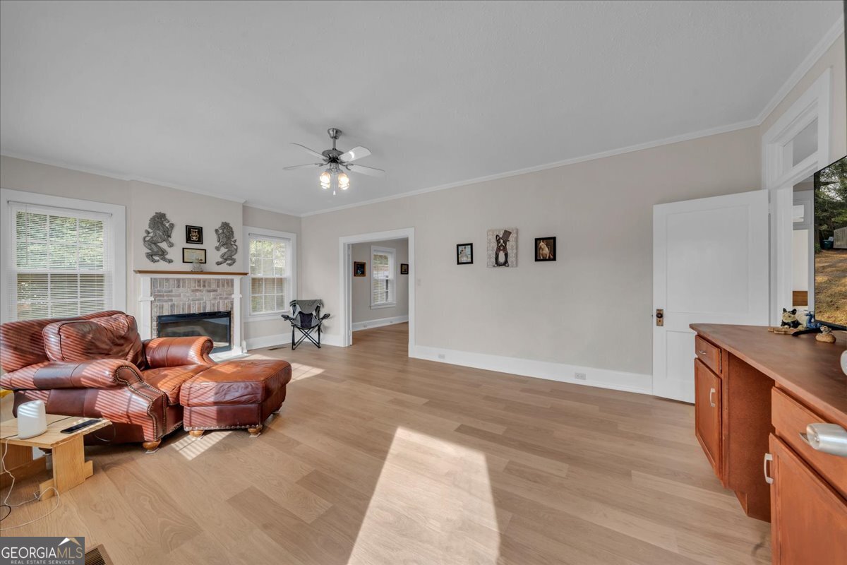 425 3rd Street Vienna, GA 31092 - Photo 2 of 40 a living room with furniture