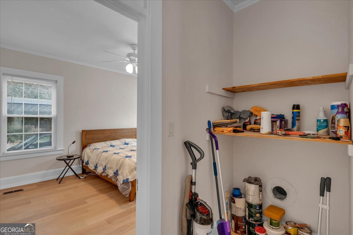 425 3rd Street Vienna, GA 31092 - Photo 22 of 40 a bedroom with a bed and a window