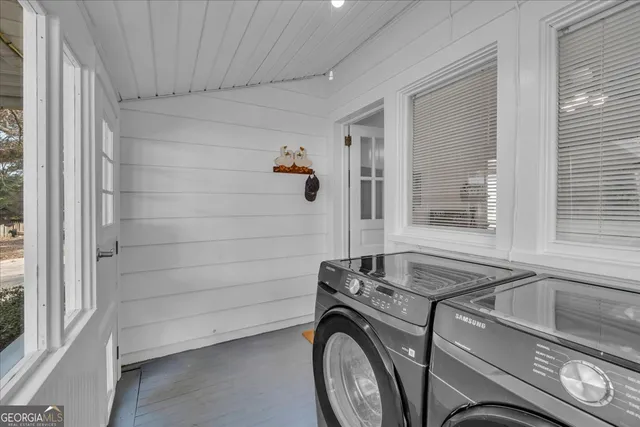 a utility room with dryer and washer