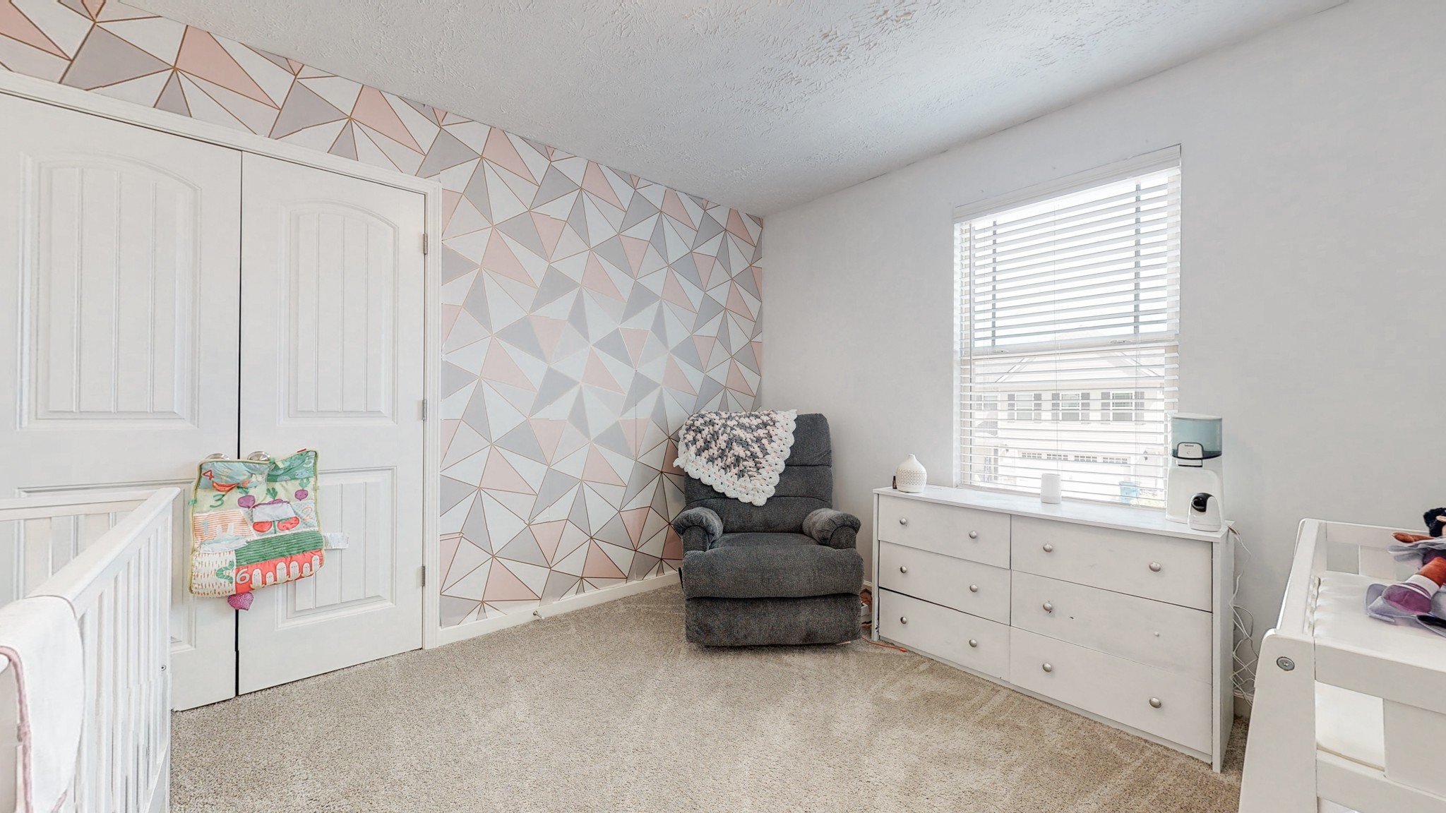 301 Homer Jackson Drive Smyrna, TN 37167 - Photo 21 of 27 a bedroom with a bed and a window