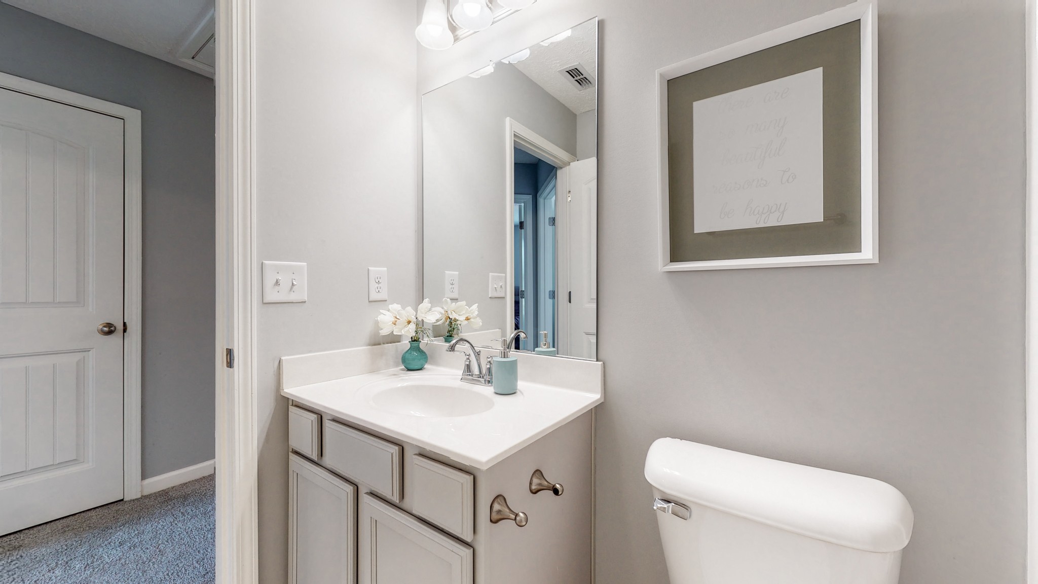 301 Homer Jackson Drive Smyrna, TN 37167 - Photo 22 of 27 a bathroom with a toilet sink and mirror