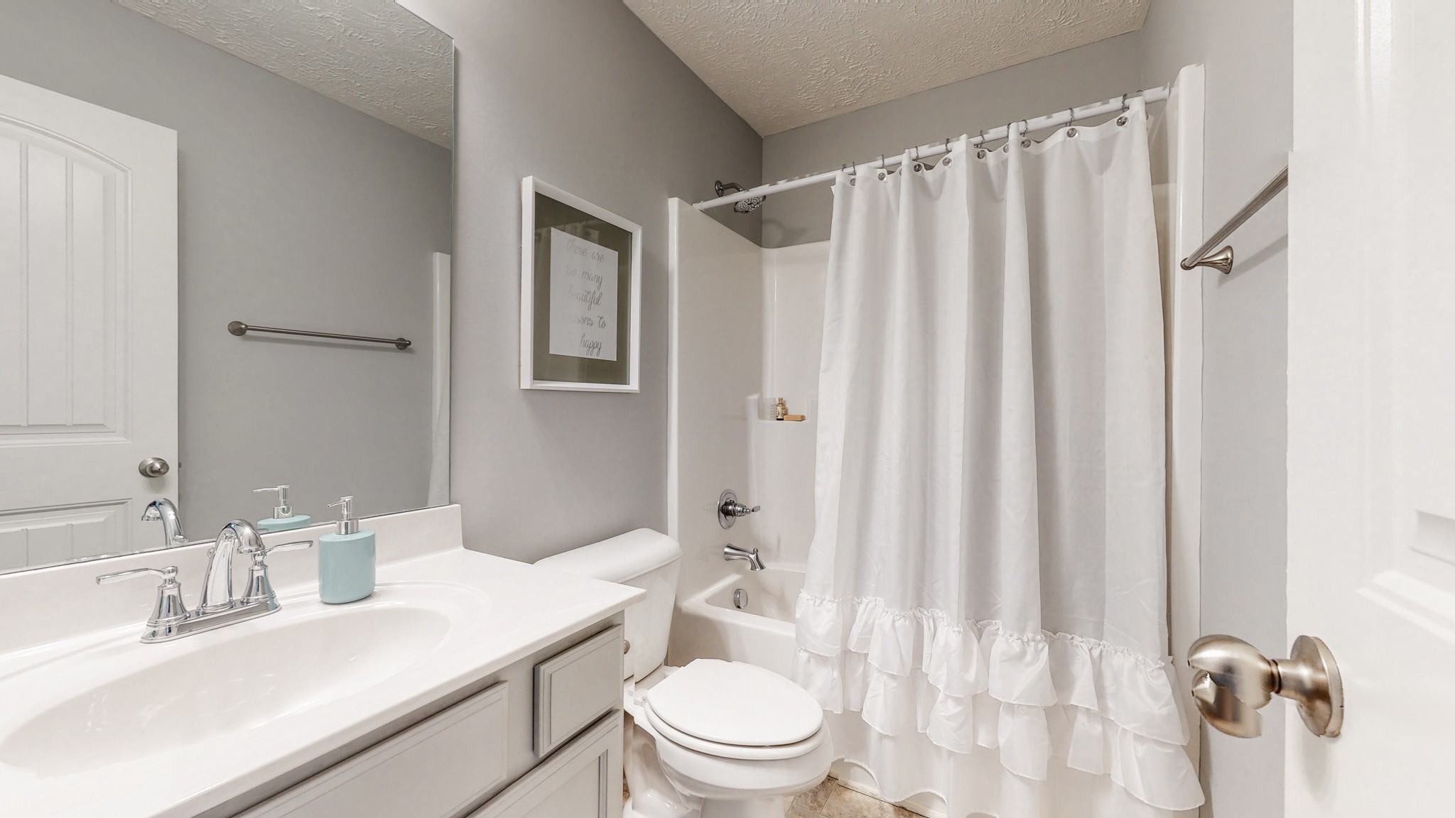 301 Homer Jackson Drive Smyrna, TN 37167 - Photo 23 of 27 a bathroom with a sink a toilet and shower curtain