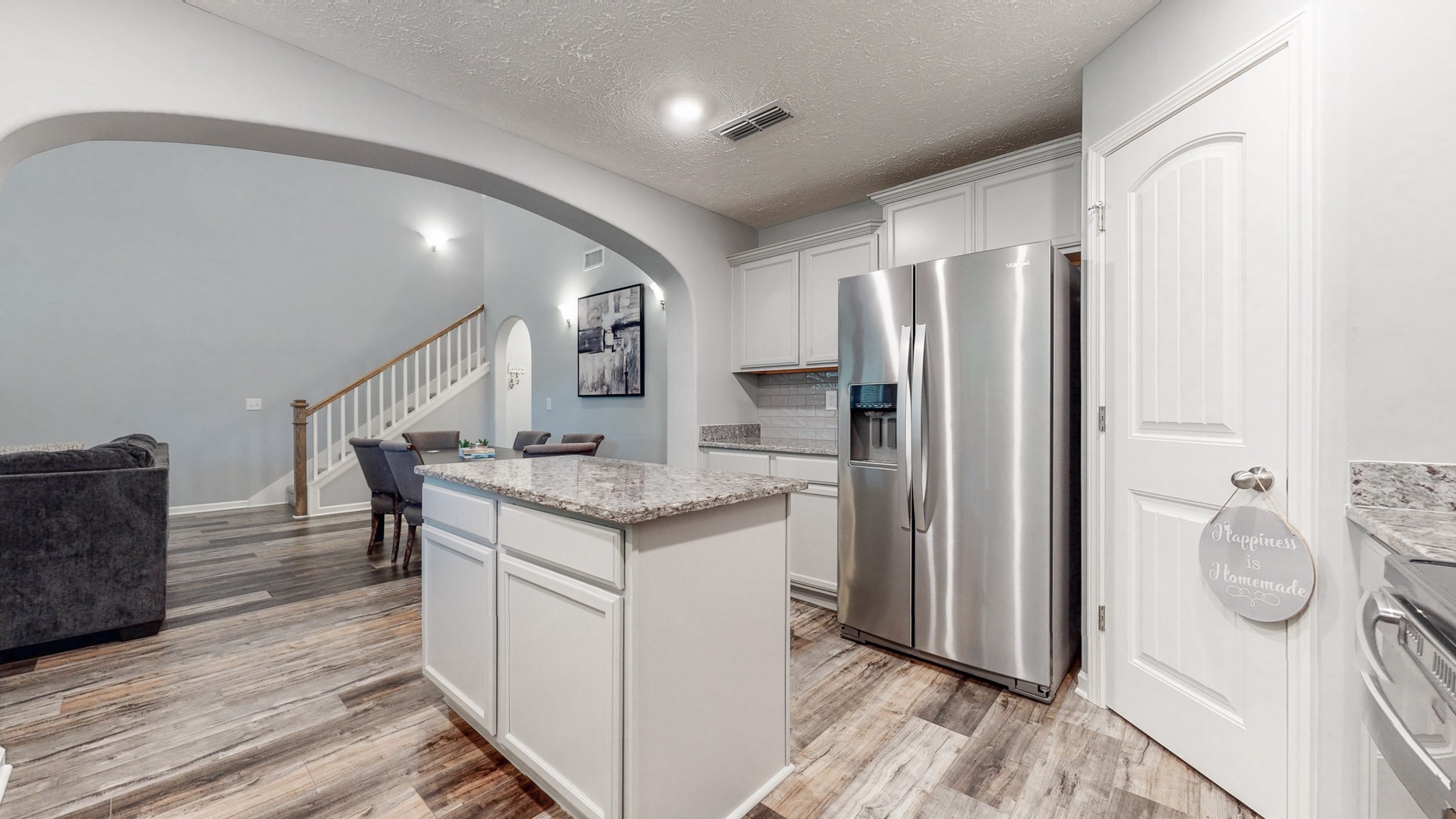 301 Homer Jackson Drive Smyrna, TN 37167 - Photo 8 of 27 a kitchen with a refrigerator and countertop