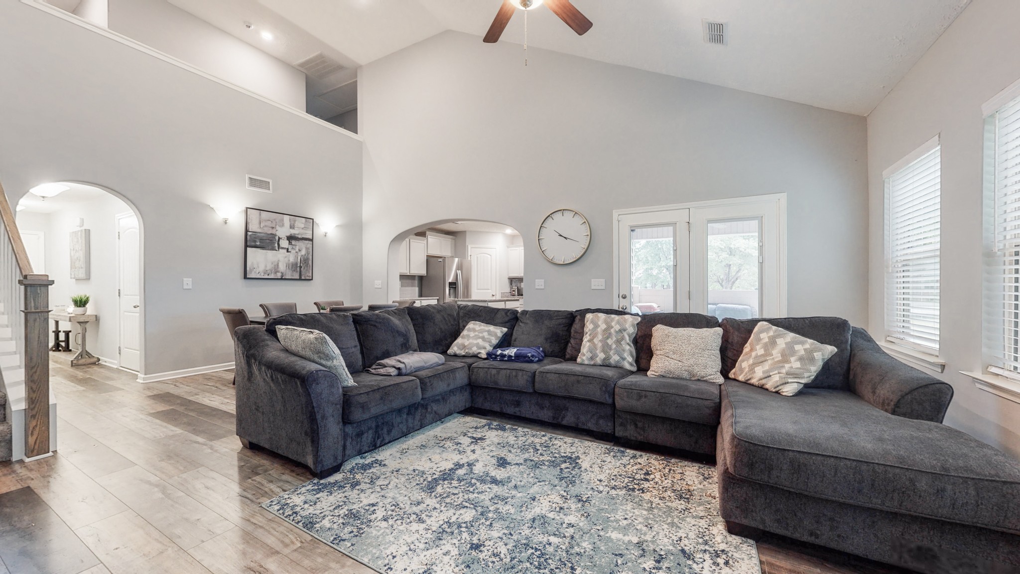 301 Homer Jackson Drive Smyrna, TN 37167 - Photo 10 of 27 a living room with couches and a large mirror with wooden floor