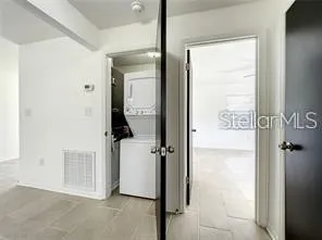 a view of empty room with windows