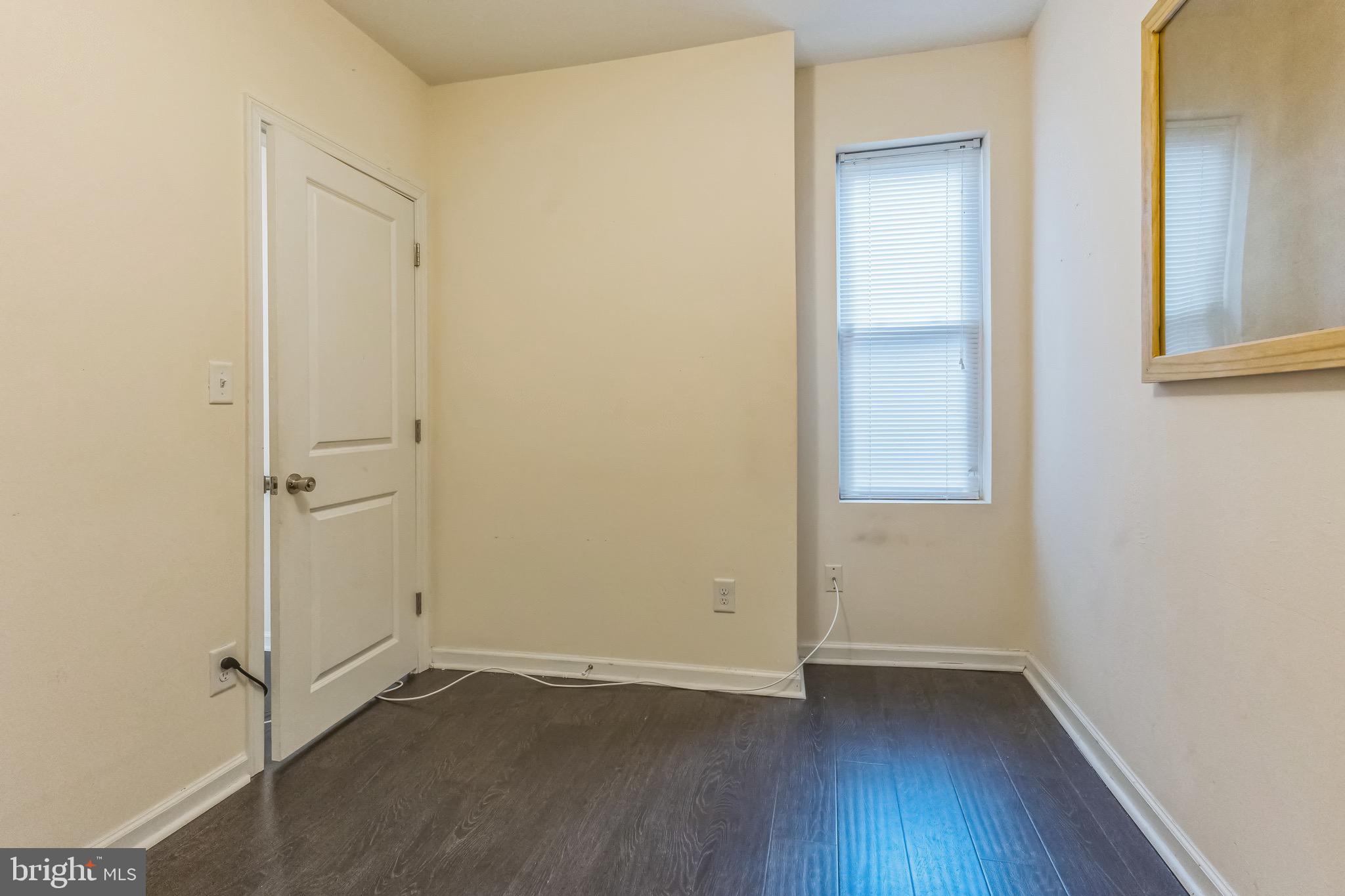 2233 Moore Street Philadelphia, PA 19145 - Photo 16 of 24 an empty room with wooden floor and closet