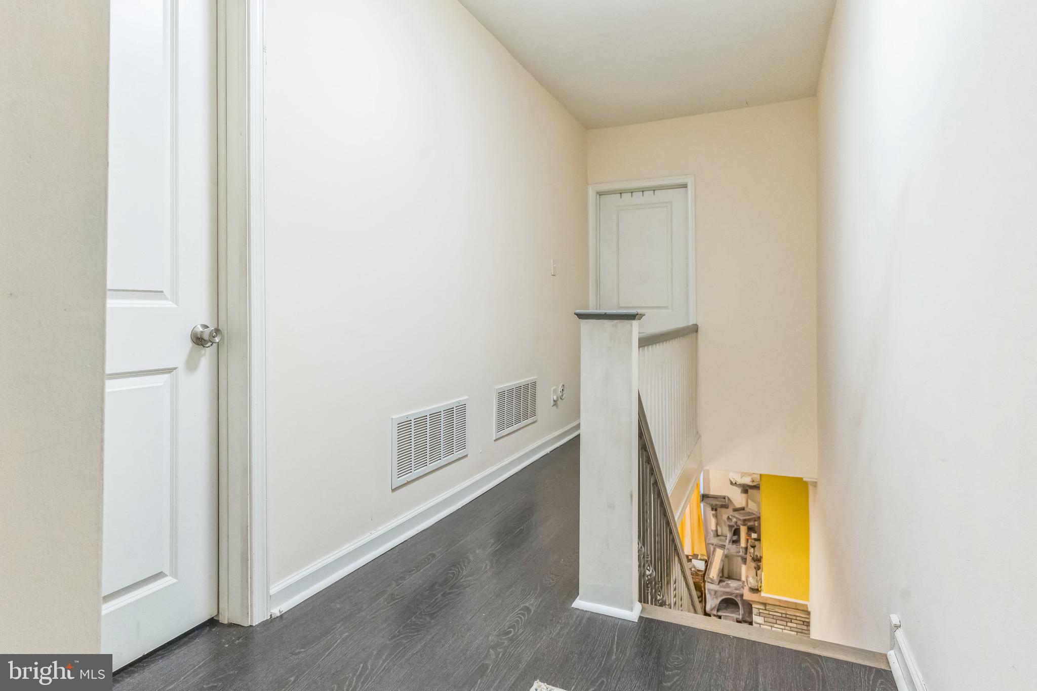 2233 Moore Street Philadelphia, PA 19145 - Photo 20 of 24 a view of an entryway with wooden floor
