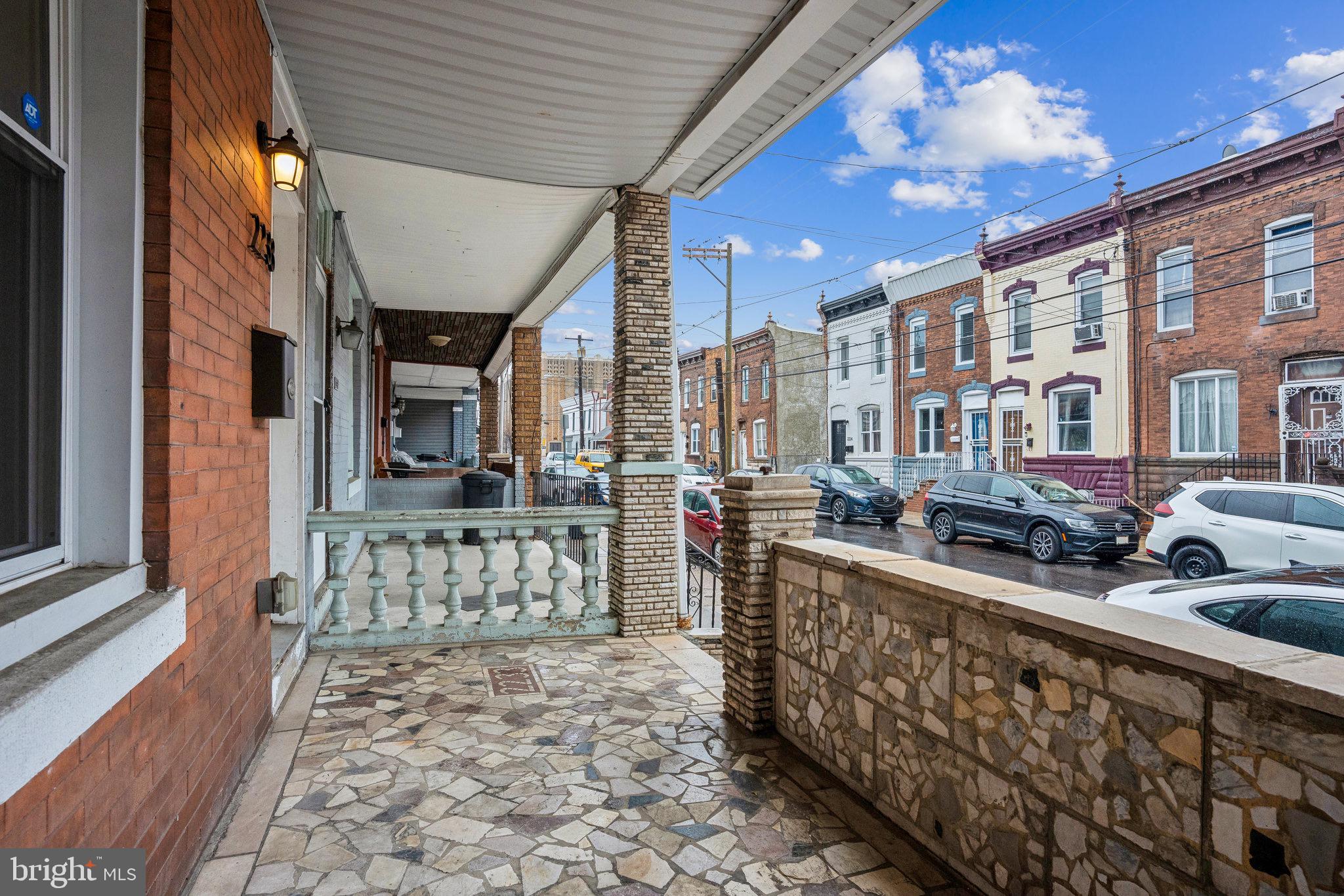 2233 Moore Street Philadelphia, PA 19145 - Photo 2 of 24 a view of a balcony with chairs