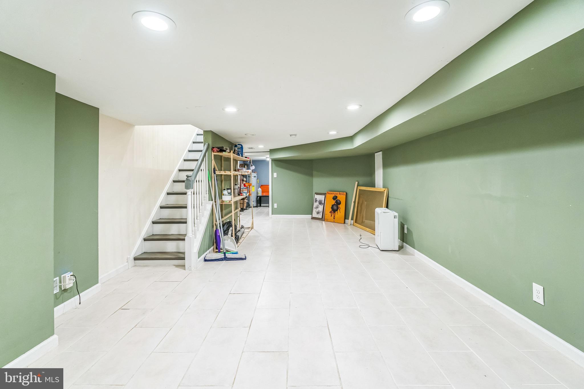 2233 Moore Street Philadelphia, PA 19145 - Photo 21 of 24 a view of an empty room with stairs