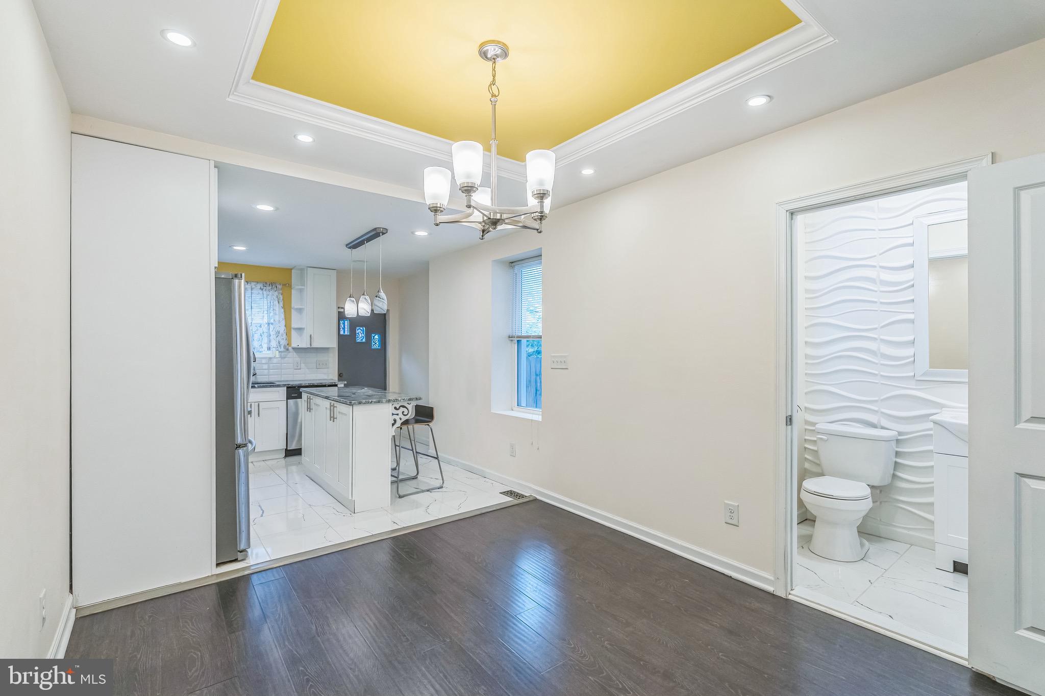 2233 Moore Street Philadelphia, PA 19145 - Photo 7 of 24 a view of a livingroom with a chandelier