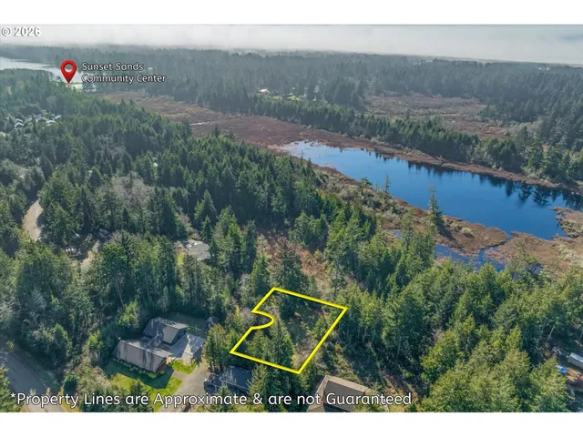 a aerial view of a house with a yard