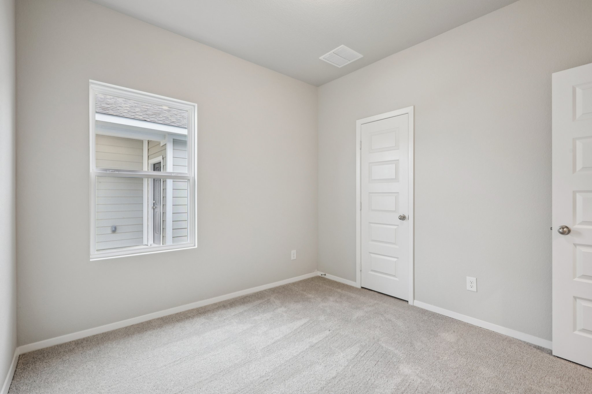 104 Summer Drive Elgin, TX 78621 - Photo 28 of 40 an empty room with windows and closet