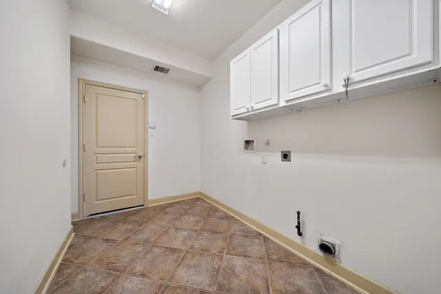 a view of a lake with a building in the background